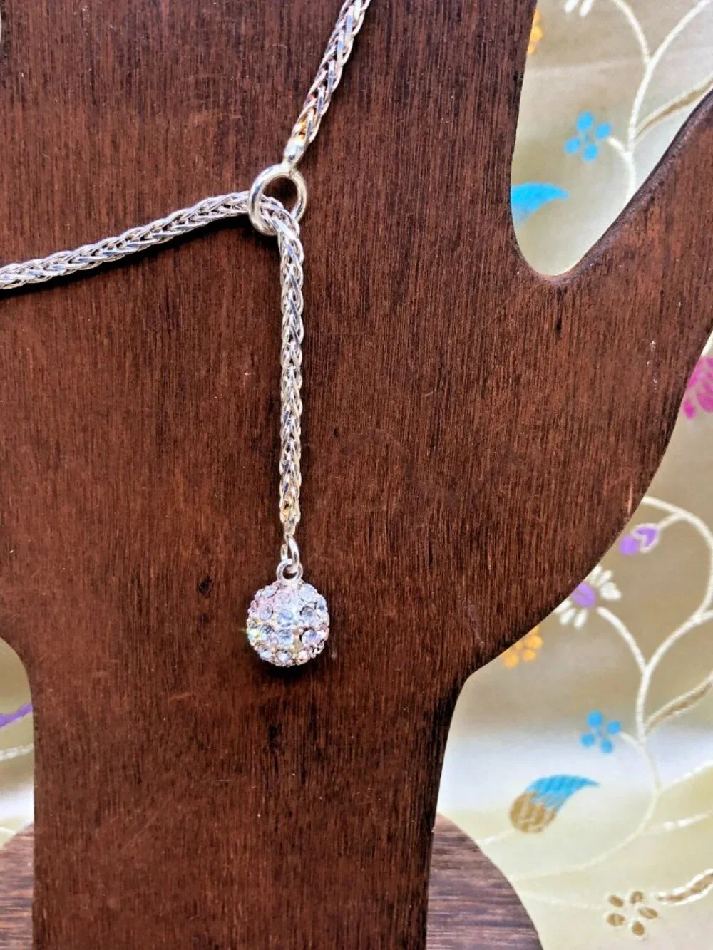 8 inch sterling silver lariat slide bracelet with rhinestone glitter ball. 8+ gr